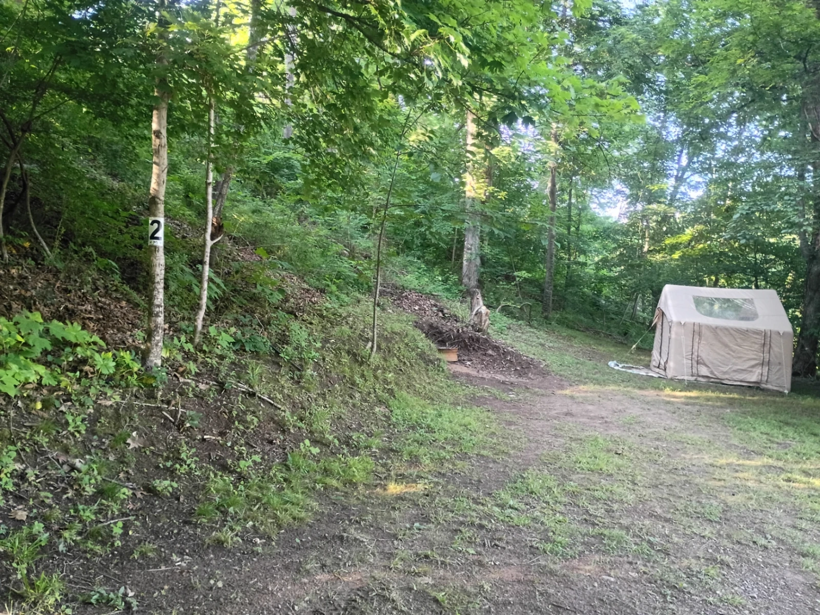 Honeymoon tent on the hillside at River's Edge